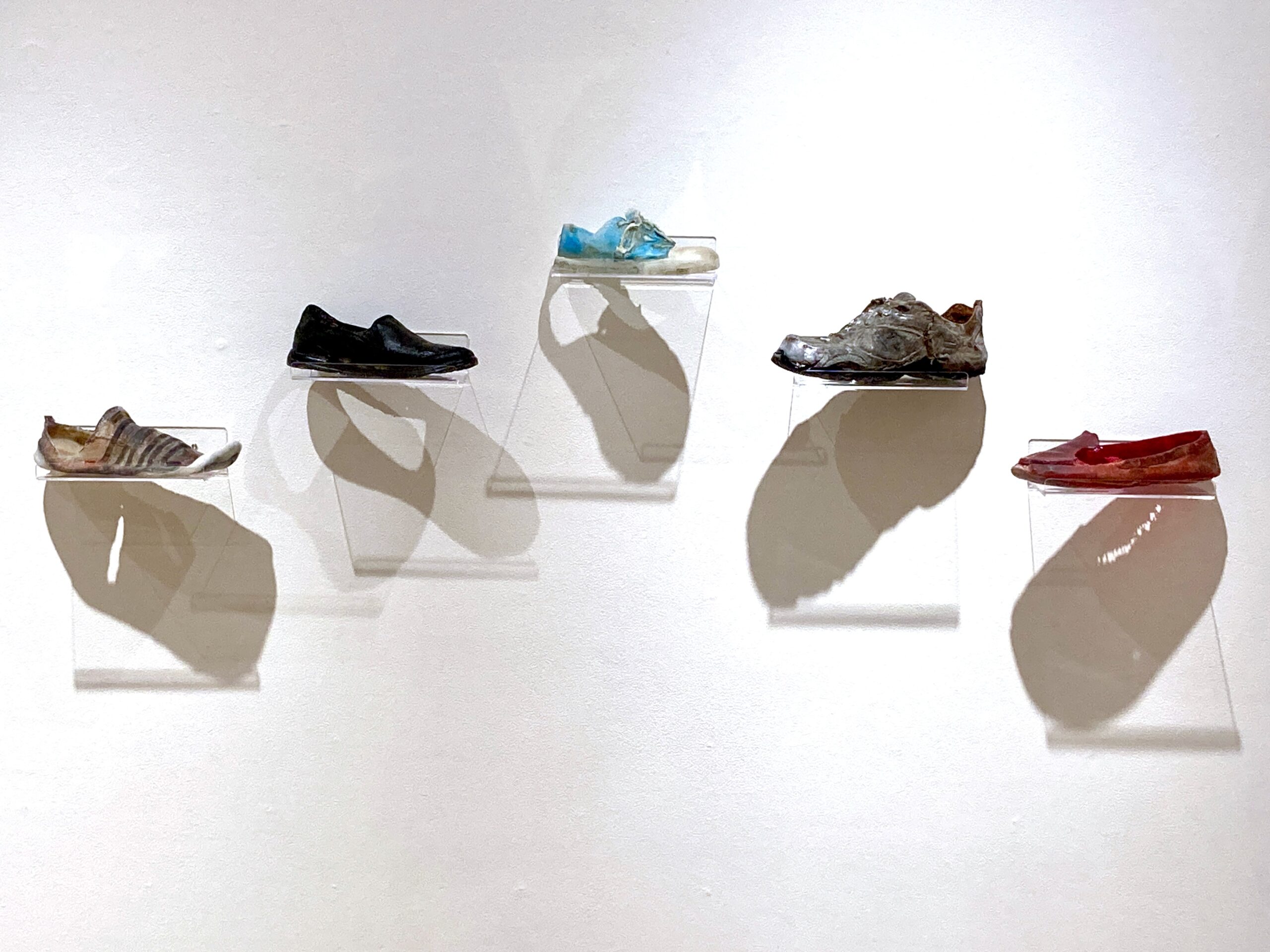 Settles_shoesonwall